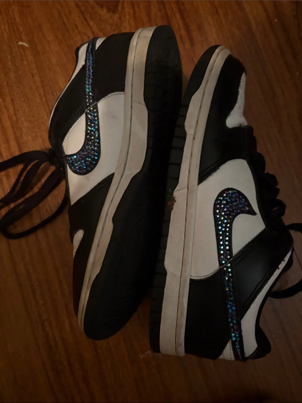 Nike Black and White Low-Top Sneakers with Iridescent Swoosh